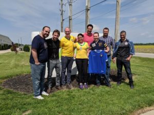 Jared knotts and several of his former Brazilian coworkers.