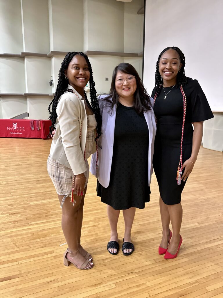 Dr. Hester pictured with two students.